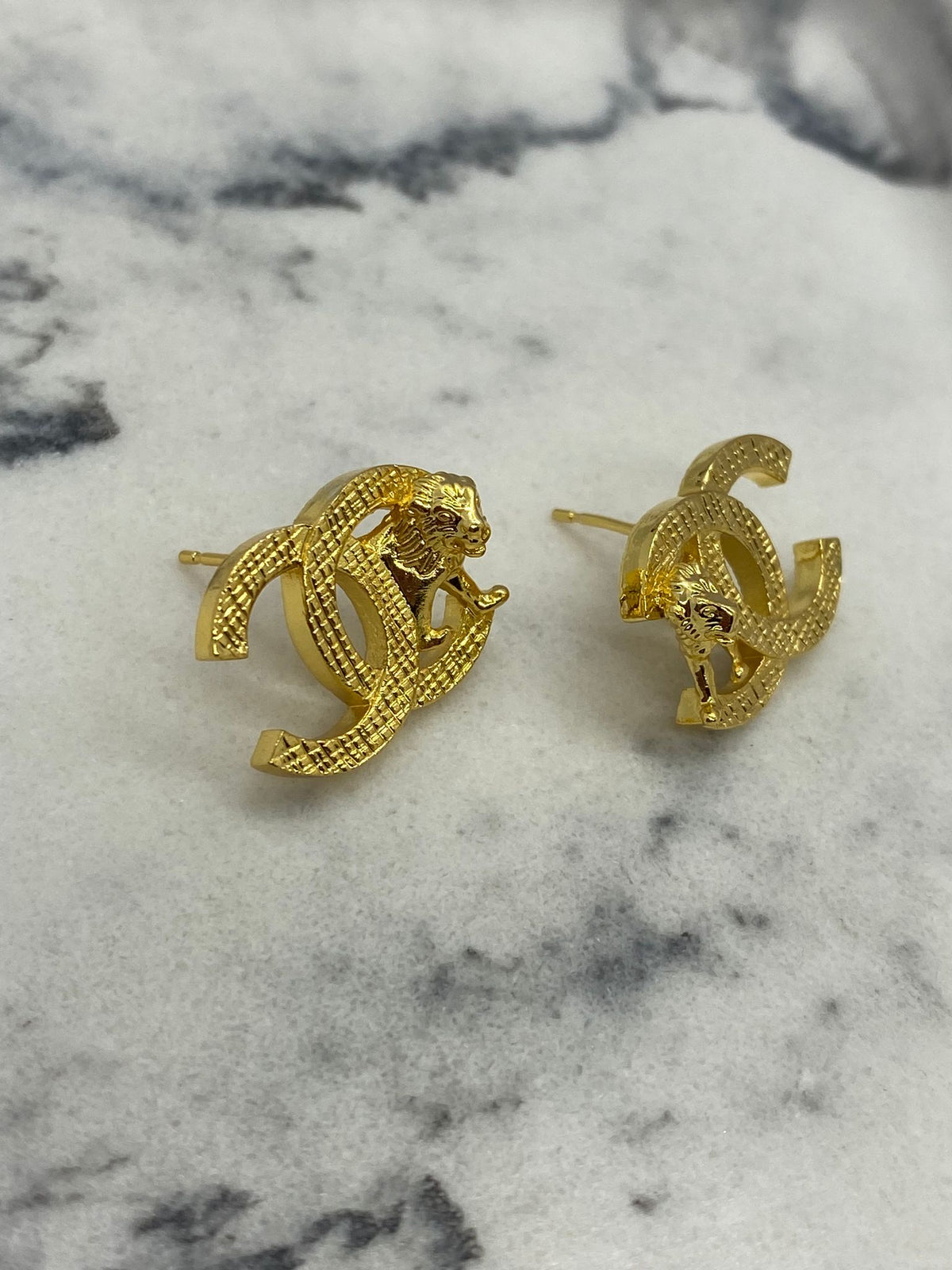 CHANEL CC Gold Tone Lion Earrings - Pre owned
