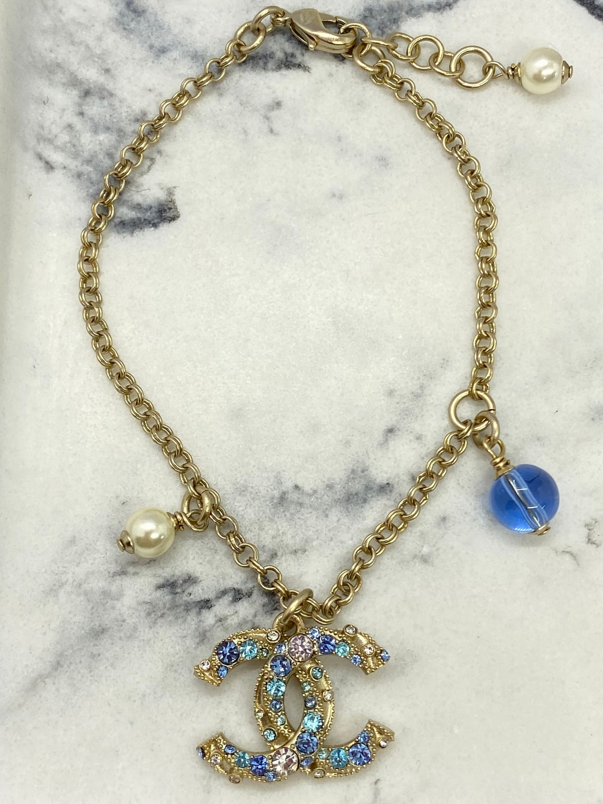 CHANEL CC Gold Tone Blue Rhinestone Charm Bracelet - Pre owned