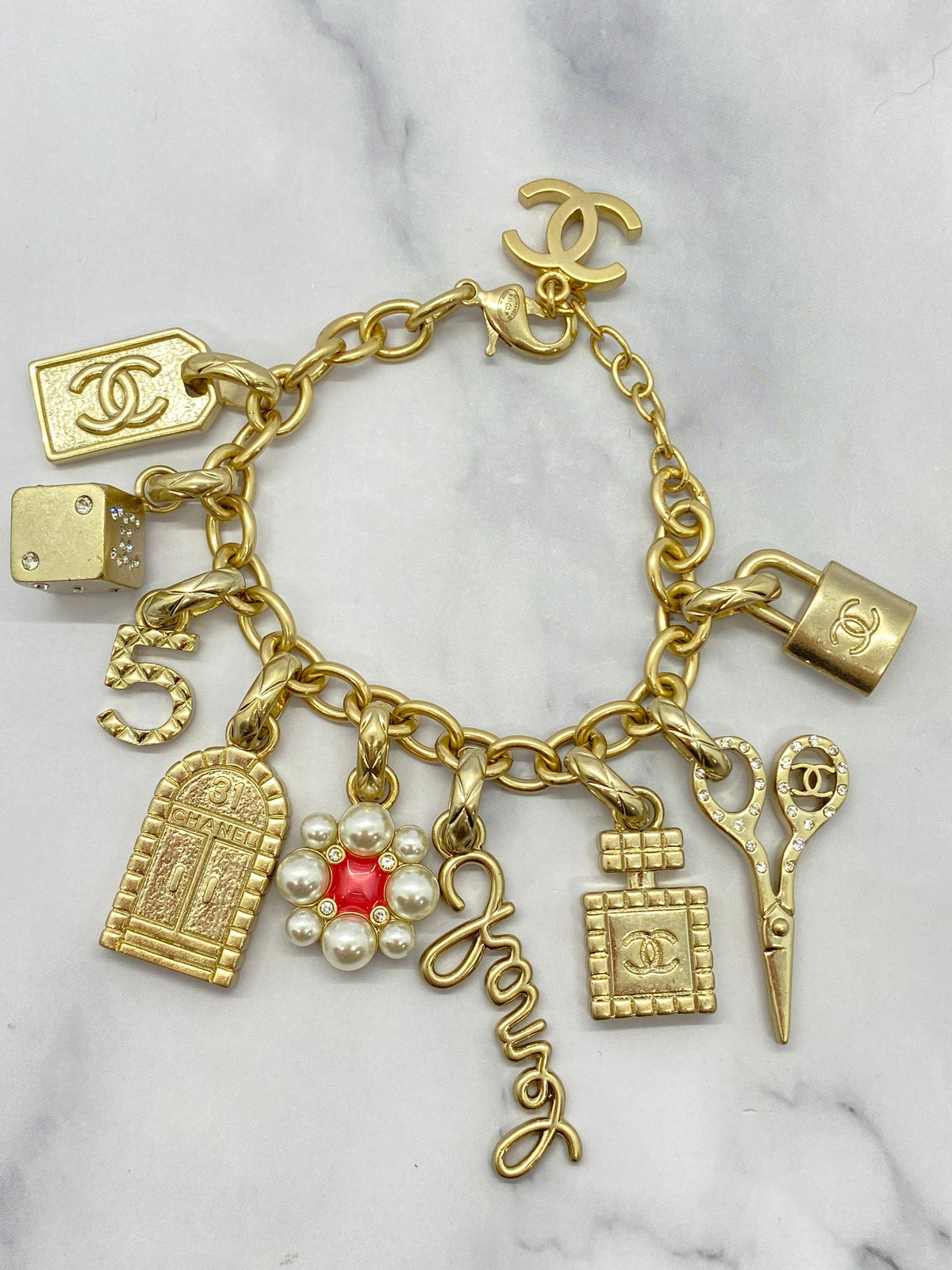 CHANEL CC Gold Tone Charm Bracelet - Pre owned