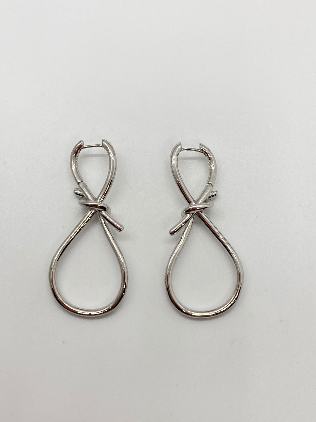 APM MONACO Silver Tone Knot Double Hoop Earrings - Pre owned