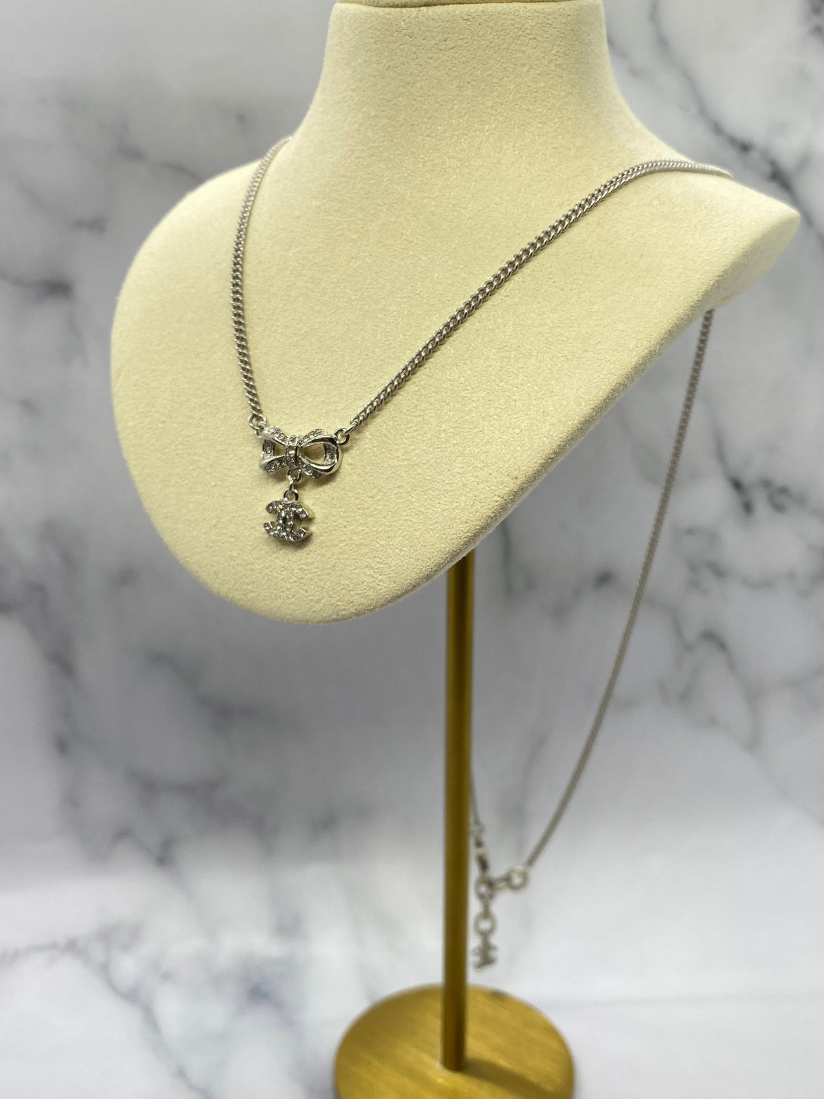 Auth CHANEL CC Silver Rhinestone Bow Necklace - USED