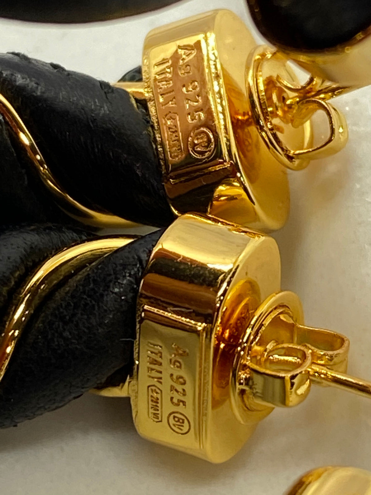 BOTTEGA VENETA Black Leather Gold Tone Twist Earrings - Pre owned