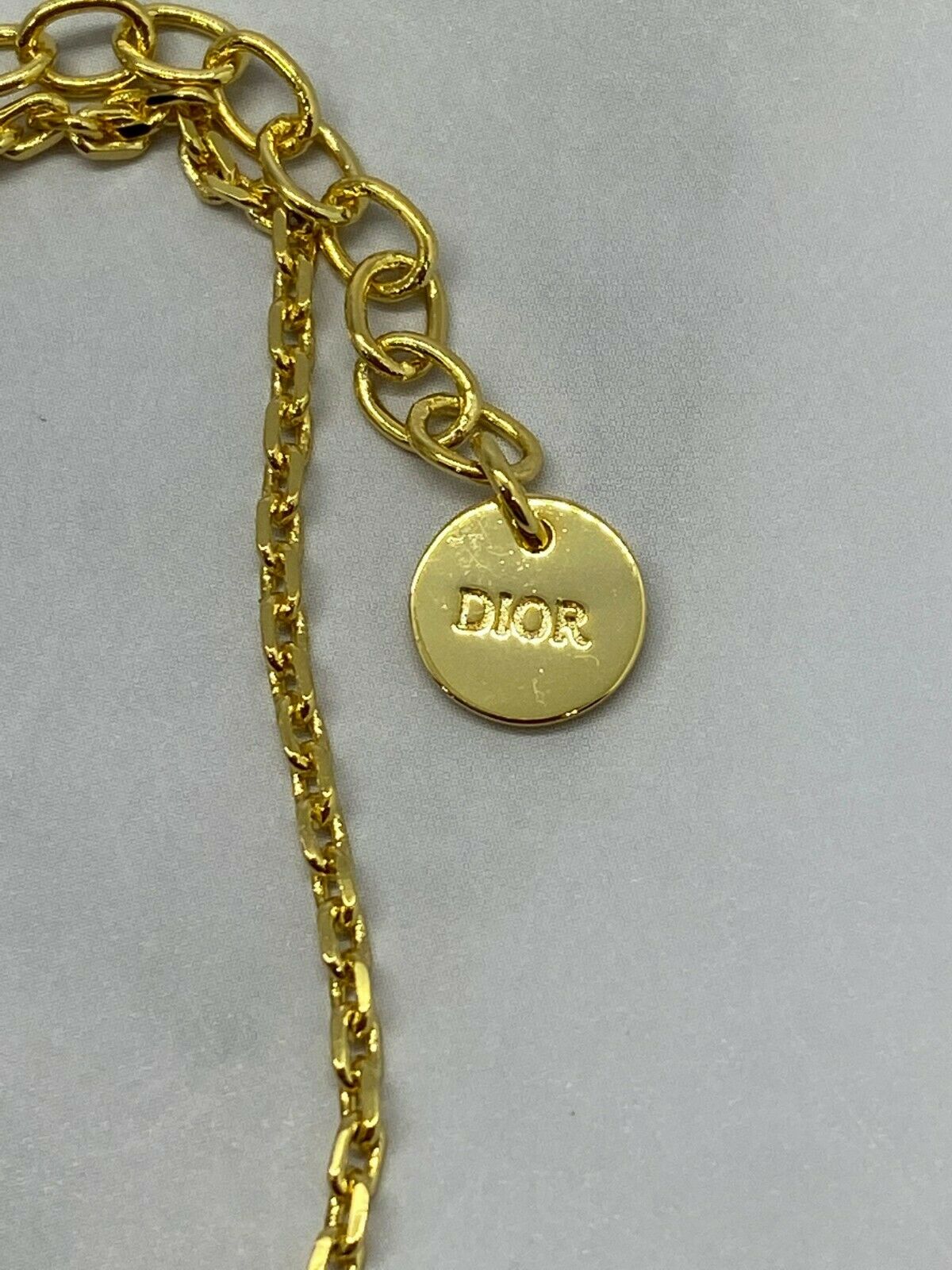 CHRISTIAN DIOR CD Gold Tone Spike Charm Necklace - USED