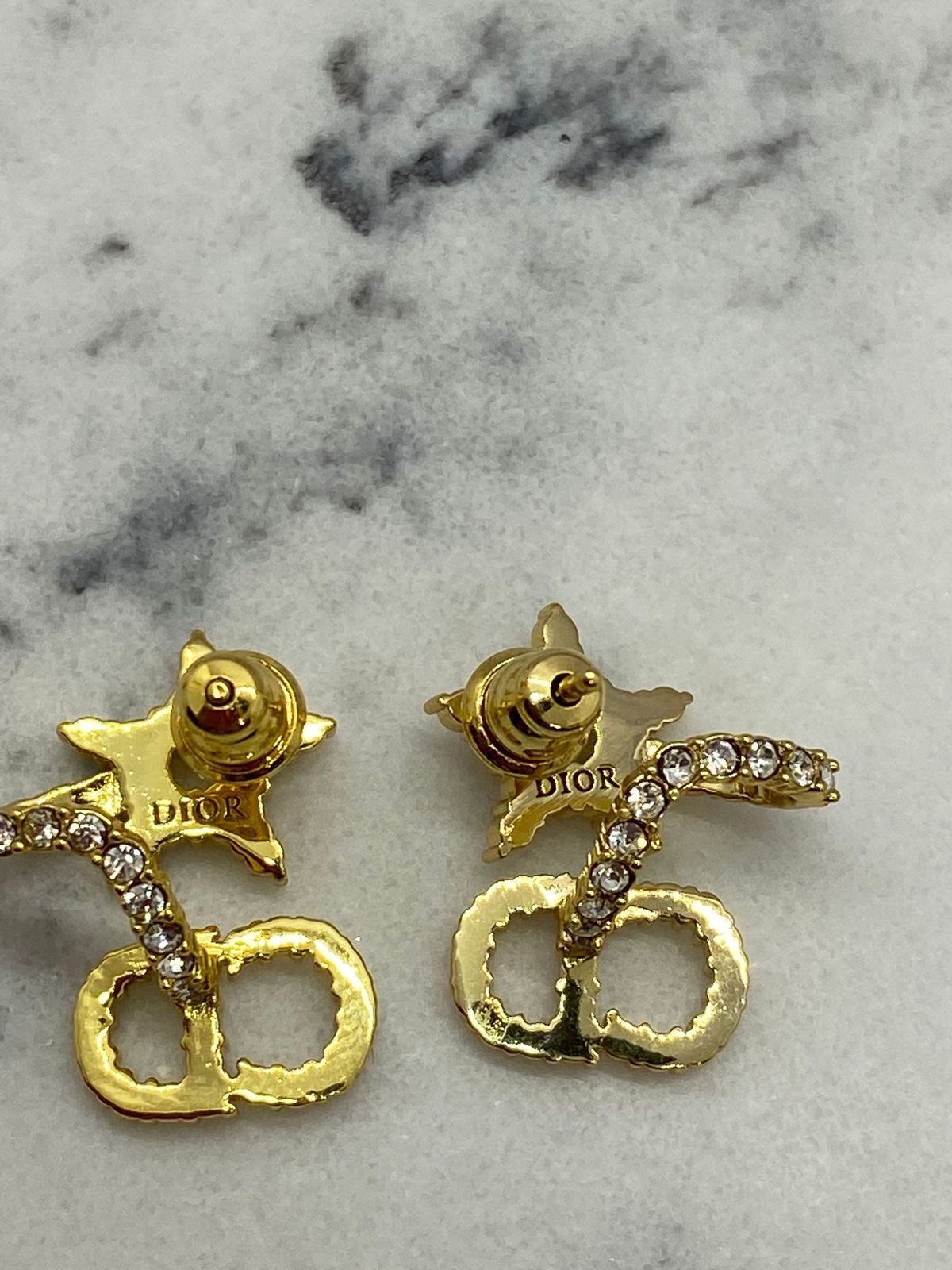 CHRISTIAN DIOR CD Gold Tone Rhinestone Star Earrings - Pre Owned