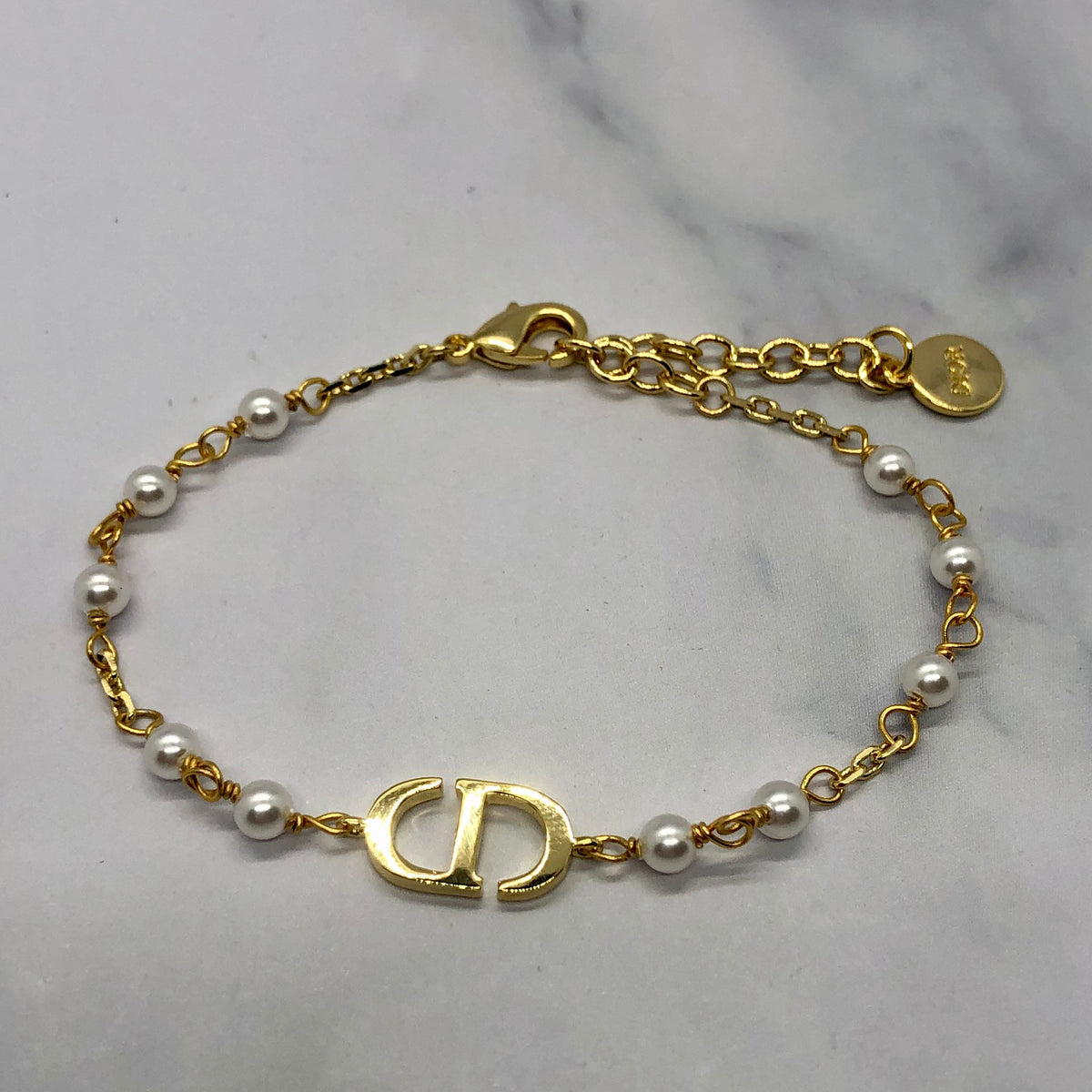 CHRISTIAN DIOR CD Pearl Trim Gold Bracelet - Pre owned