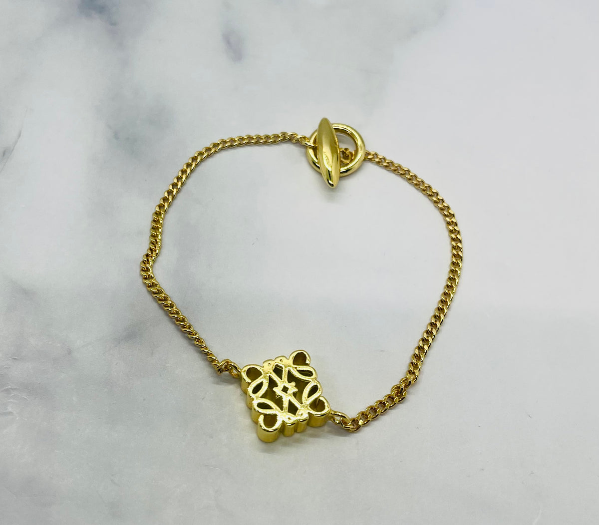 LOEWE Gold Tone Monogram Bracelet - Pre owned