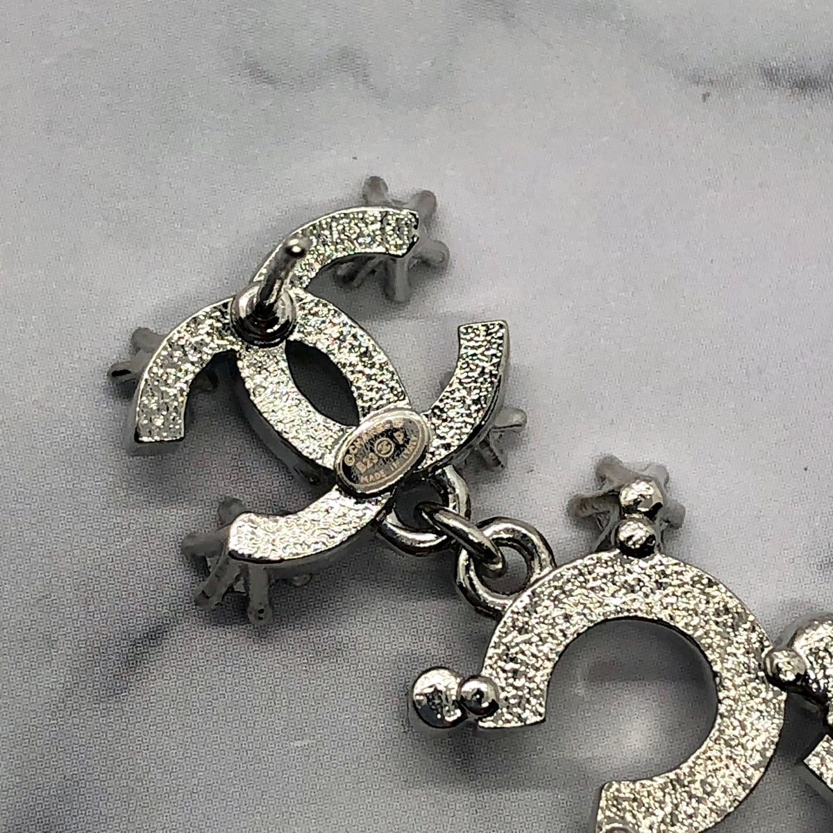 CHANEL CC Silver Tone Rhinestone Pendant Earrings - Pre owned