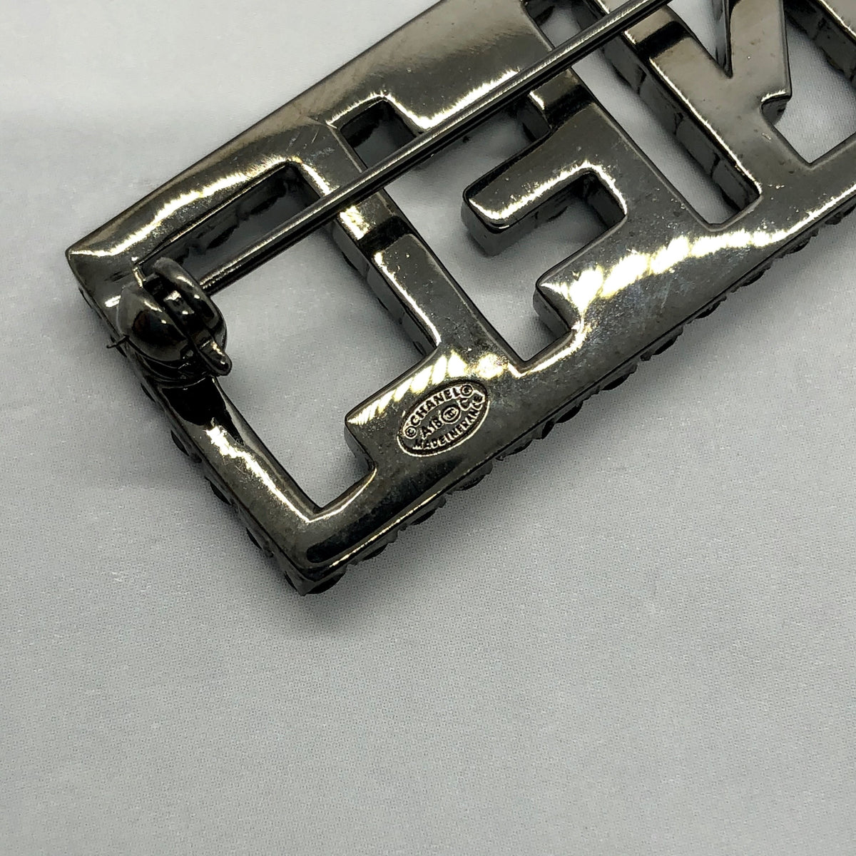 CHANEL Black Rhinestone Name Plate Brooch Pin - Pre owned