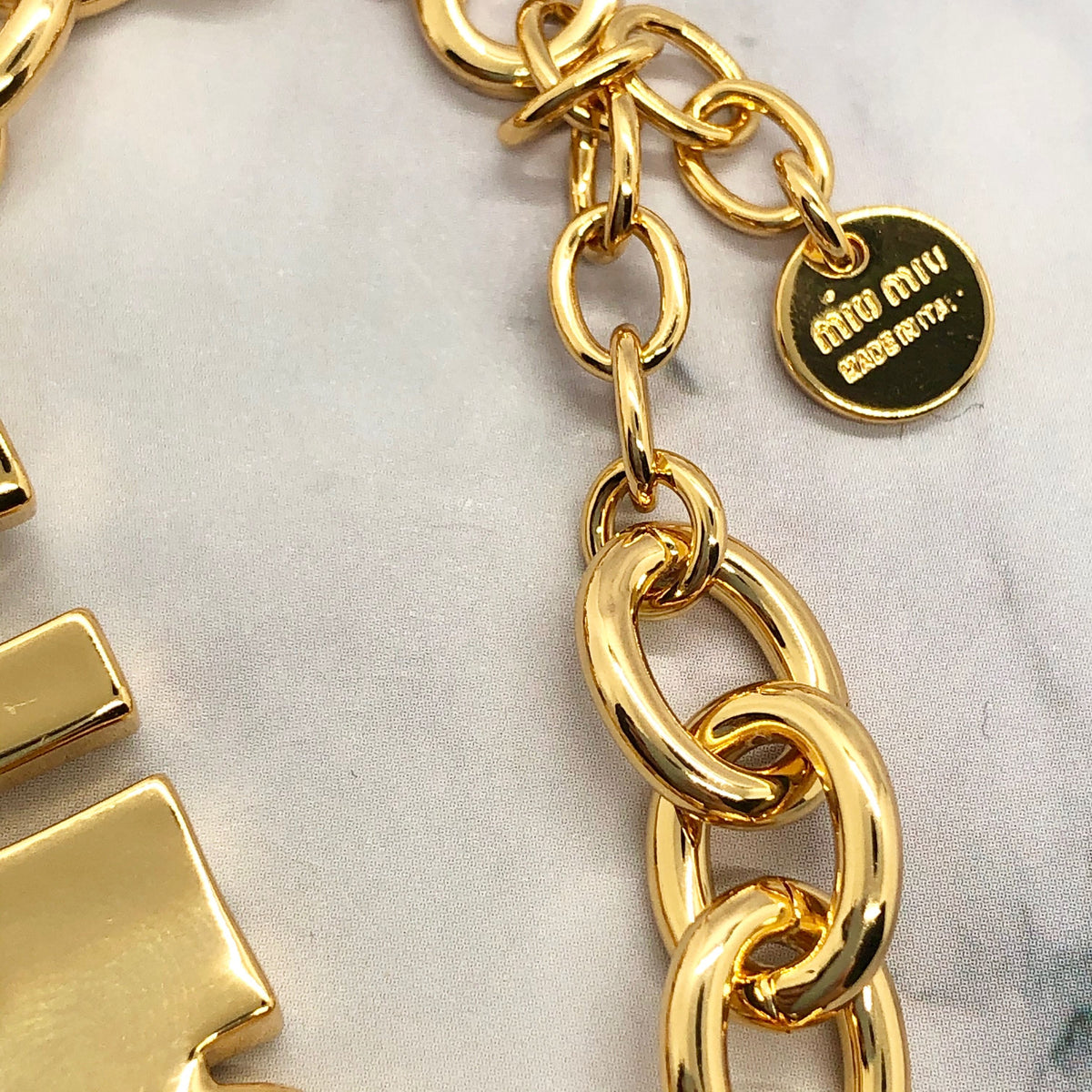 MIU MIU Gold Tone Monogram Bracelet - Pre owned