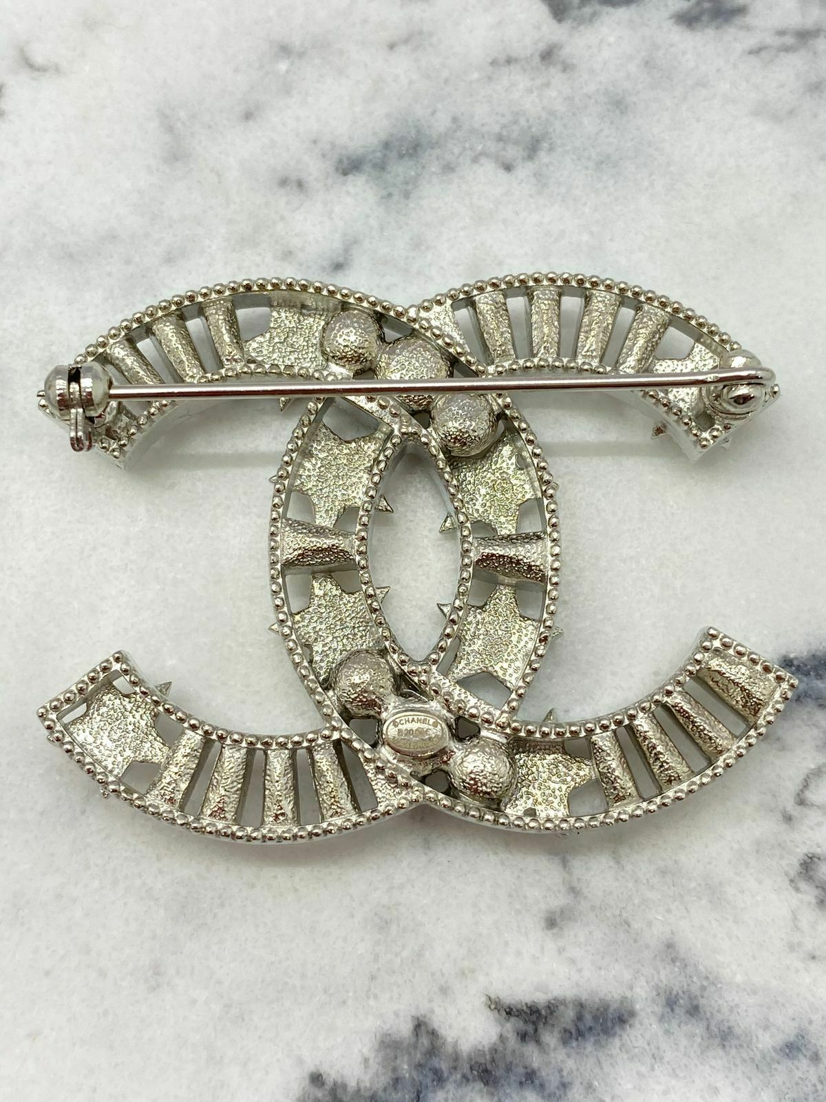 CHANEL CC Silver & Rhinestone Star Brooch Pin - Pre owned