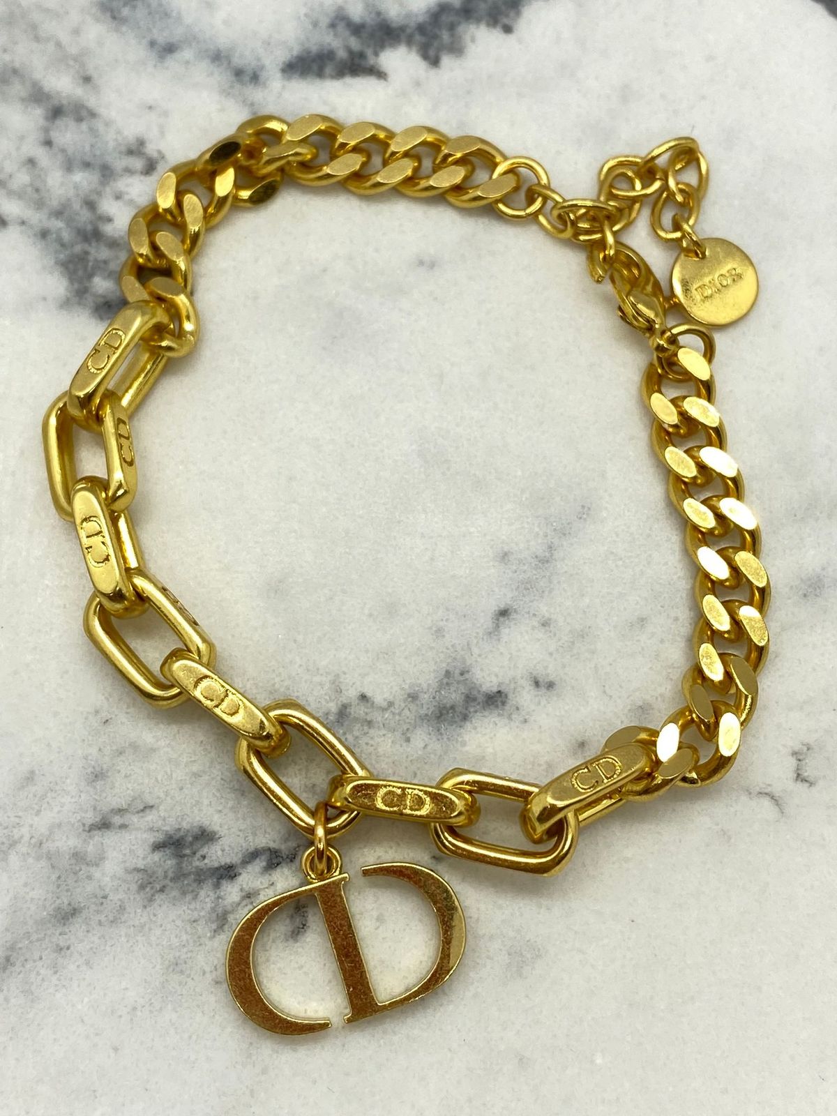 CHRISTIAN DIOR CD Gold Tone Charm Bracelet - Pre owned