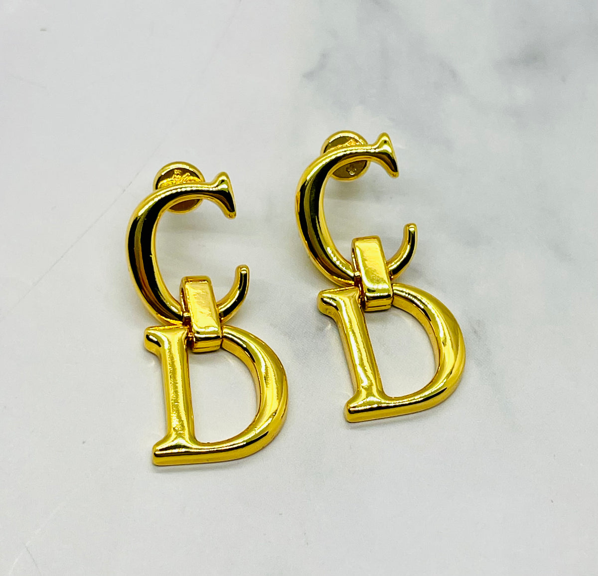 CHRISTIAN DIOR CD Gold Tone Pendant Earrings - Pre owned