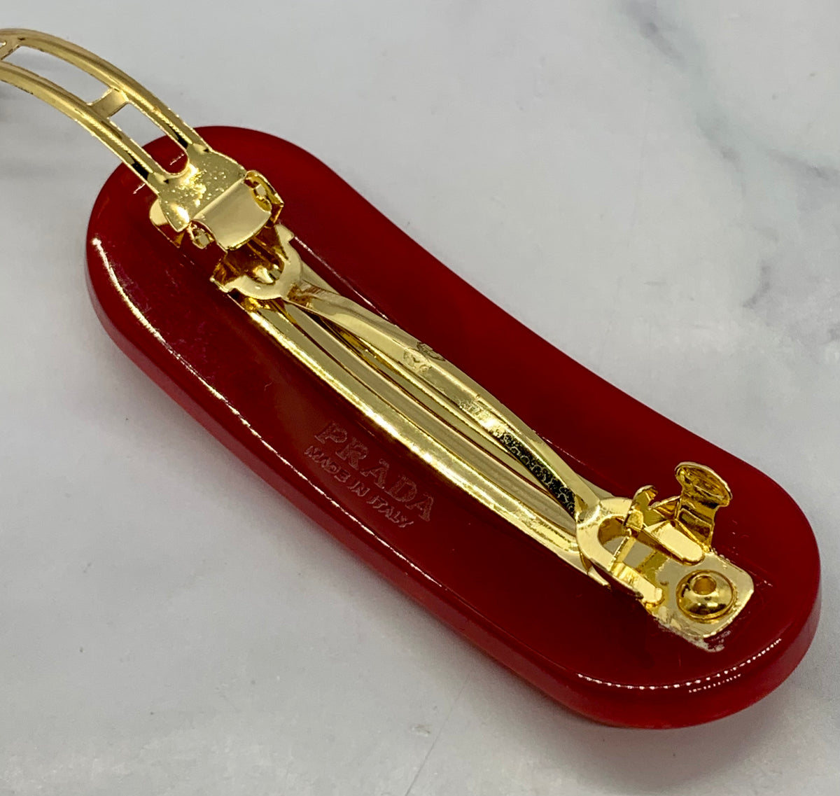 PRADA Red Acrylic Gold Stud Hair Clip Barrette - Pre owned