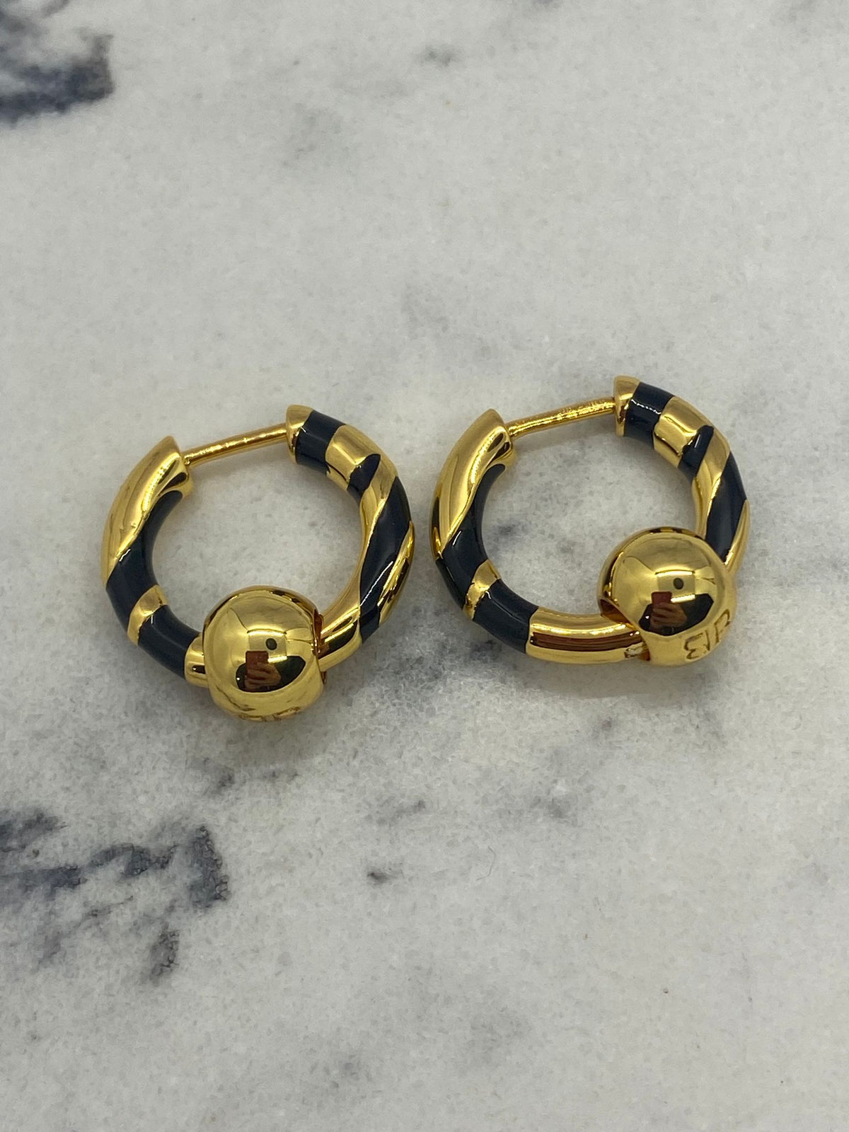 BALENCIAGA BB Gold Tone Black Strip Hoop Earrings - Pre owned