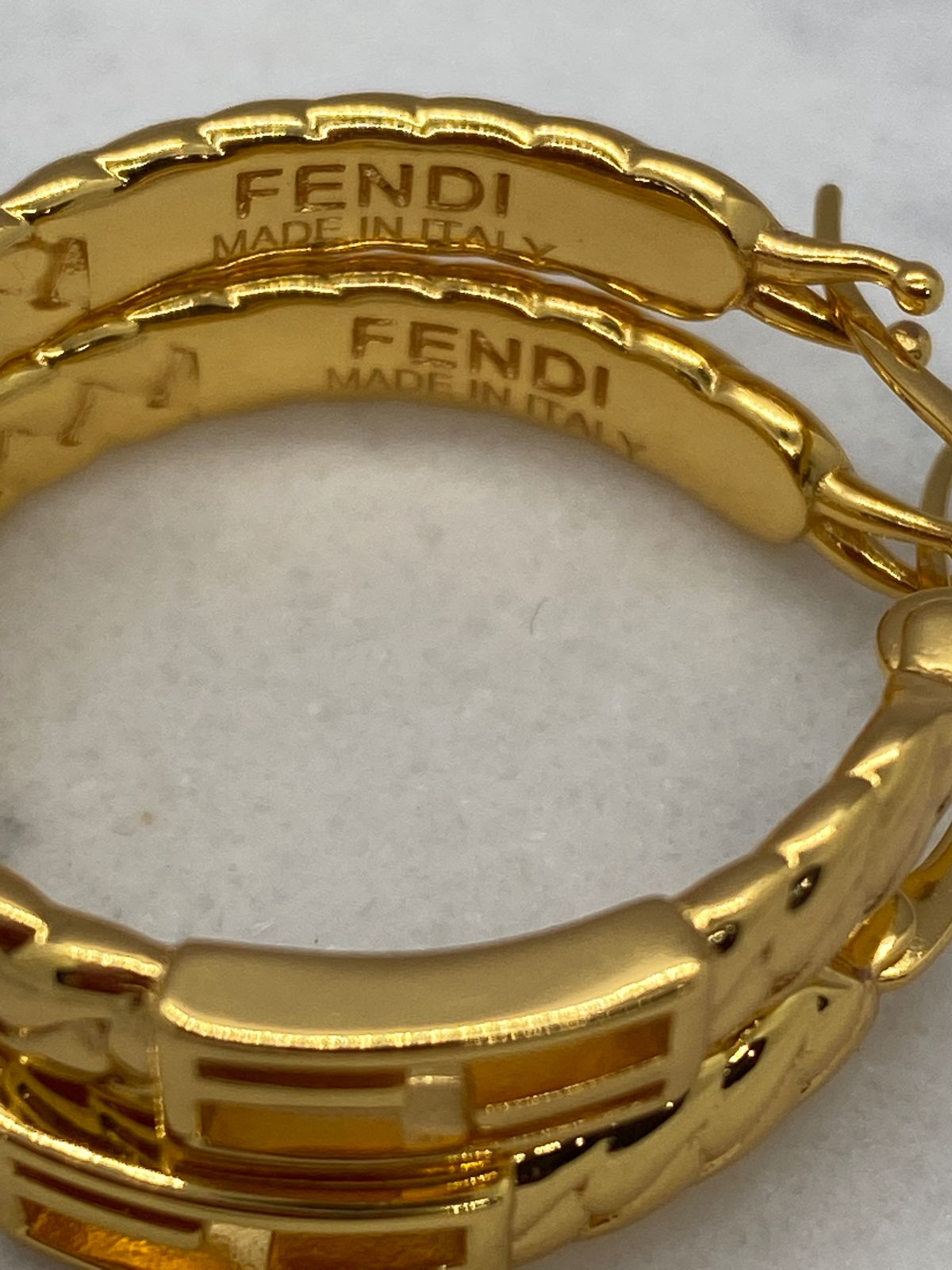 FENDI F Gold Tone Textured Hoop Earrings - Pre owned