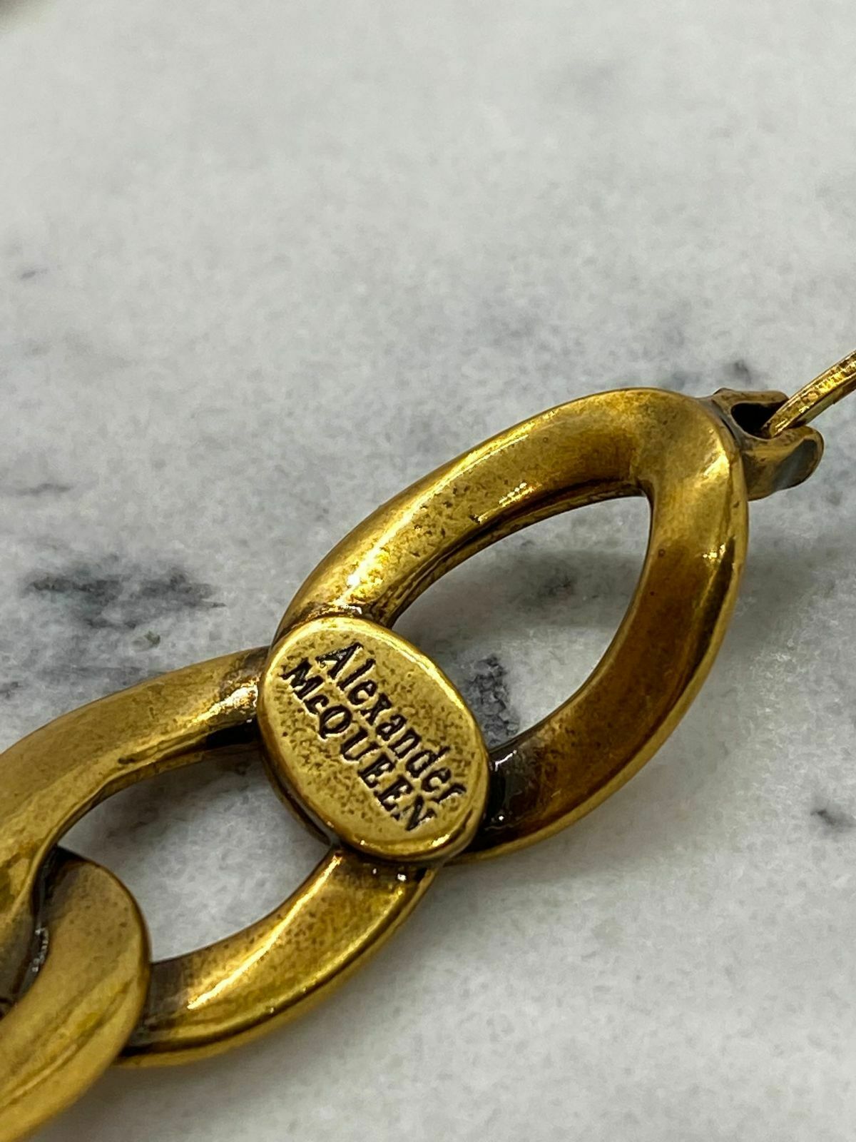 ALEXANDER MCQUEEN Brass Tone Skull Hoop Earrings - Pre owned