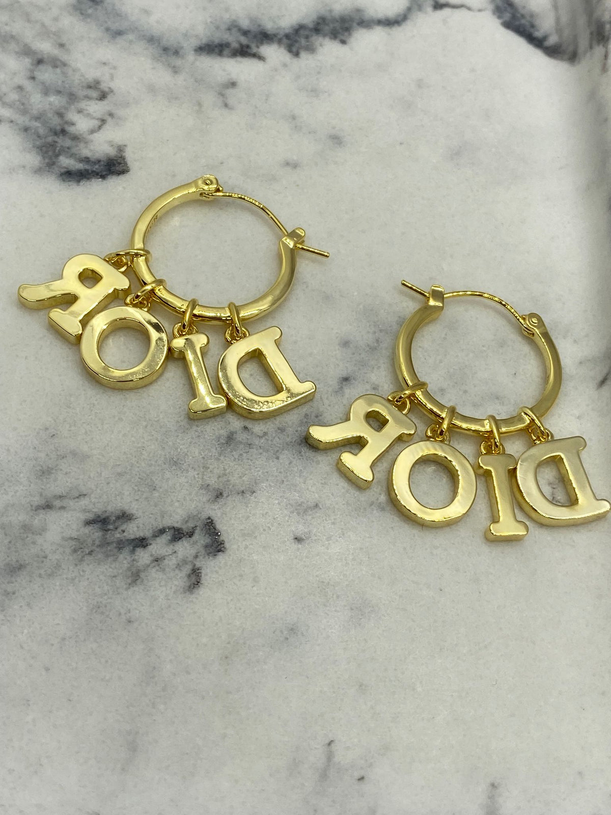 CHRISTIAN DIOR Gold Tone Charm Hoop Earrings - Pre owned