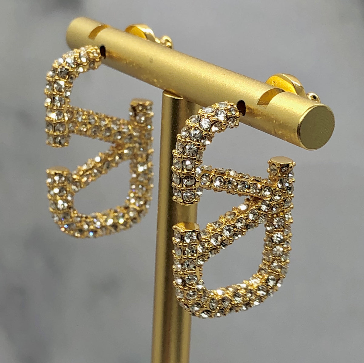 MK6429 Valentino rhinestone V monogram earrings